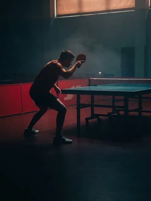 Table Tennis player in action indoors