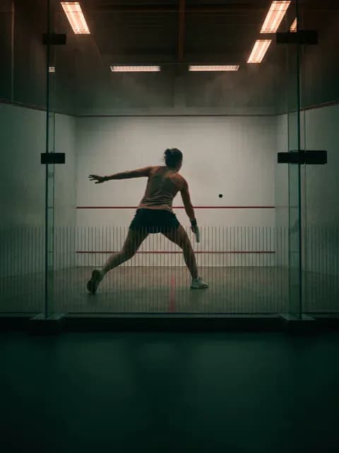 SQUASH player in action indoors